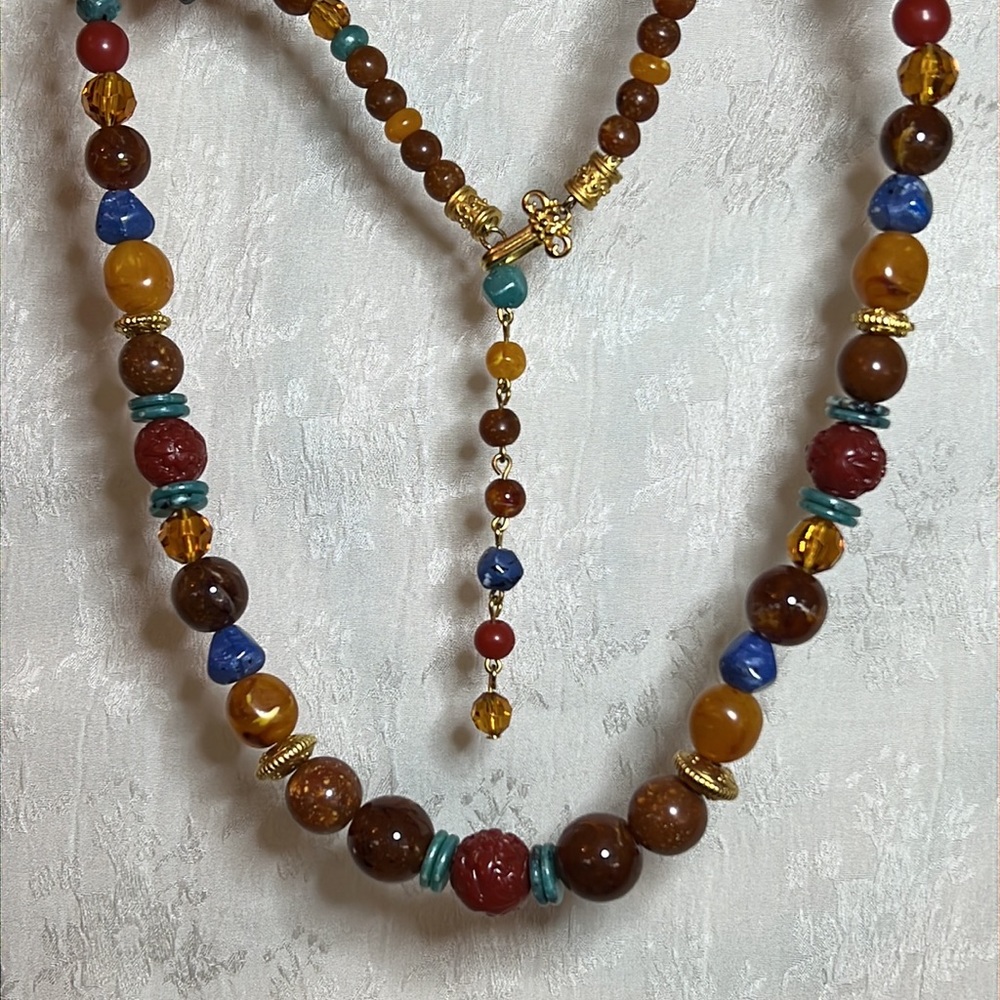 Blue amber lucite gold tone graduated bead adjustable necklace